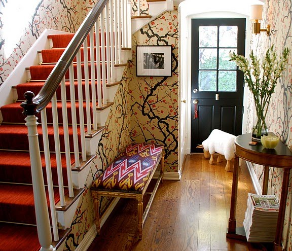 the wallpaper and the rug,